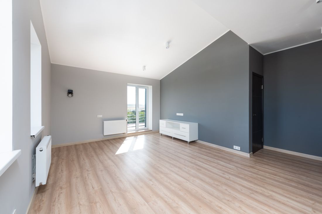 A repainted interior room with a feature wall